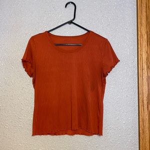 Has 3 stain spots (1 on the front & 2 on the back) could potentially come out.